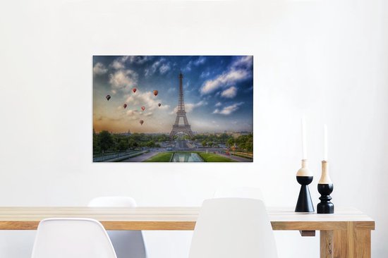Canvas Schilderij De Eiffeltoren met op de achtergrond luchtballonnen die in de lucht varen boven Parijs - 90x60 cm - Wanddecoratie