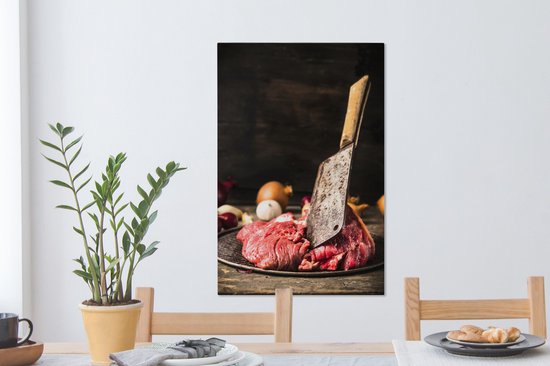 Un couteau de boucher en viande crue sur une assiette toile 40x60 cm - Tirage photo sur toile (Décoration murale salon / chambre)