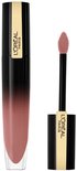 Zwarte verpakking van L'Oréal Brilliant Signature Lipstick met gouden accenten en een applicator met roze tint.