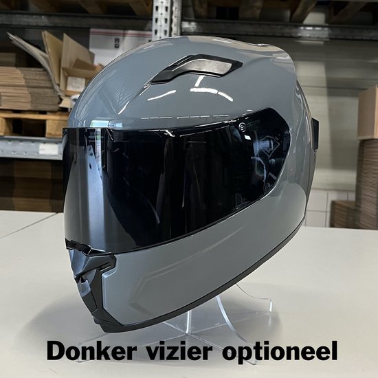 Donkergrijze integraalhelm met donker vizier, displaystandaard en tekst 'Donker vizier optioneel'.