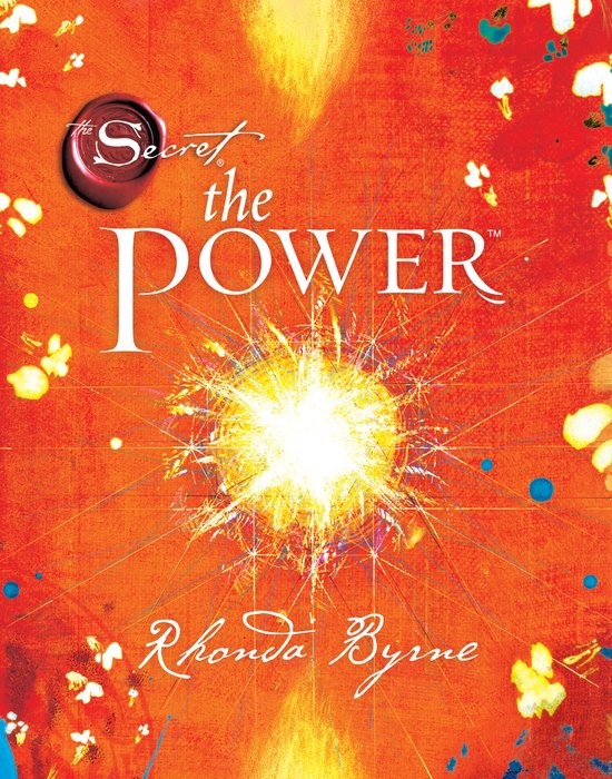 De cover van het boek 'The Power' door Rhonda Byrne met een oranje achtergrond, een explosie van licht in het midden, het woord 'POWER' in grote witte letters en het logo van 'The Secret'.