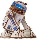 Houten R2-D2 model met de tekst 'STOP' en 'START'. De robot is wit met blauwe details.