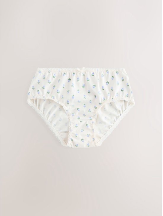 Crème onderbroek met bloemenprint, strikje en kanten rand.