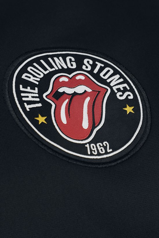 Zwart badge met het Rolling Stones logo: tong en lippen, met 'The Rolling Stones 1962'.