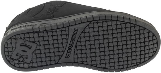 Zwarte DC Shoes sneakers, onderkant met profiel en DC Shoes logo.