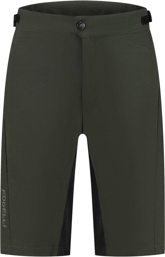Voorkant van een donkergroene fietsbroek met een zwart inzetstuk aan de zijkant en het logo "Rogelli"
op het been.