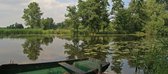 Fotobehang Woerdense Verlaat met oude roeiboot 350 x 260 cm