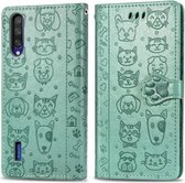 Voor xiaomi mi cc 9/9 lite / a3 lite schattige kat en hond reliëf horizontale flip pu lederen tas met houder / kaartsleuf / portemonnee / lanyard (grasgroen)