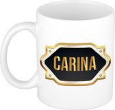 Carina naam cadeau mok / beker met gouden embleem - kado verjaardag/ moeder/ pensioen/ geslaagd/ bedankt