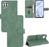 Voor Huawei nova 6 SE / P40 Lite Effen kleur Huidgevoel Magnetische gesp Horizontale flip kalftextuur PU lederen tas met houder & kaartsleuven & portemonnee (groen)