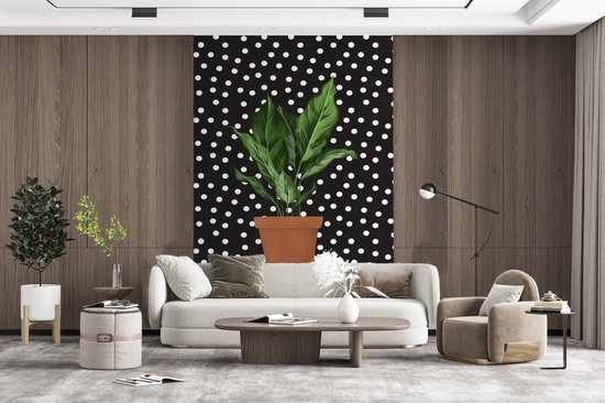 Illustration d'une plant aux feuilles luxuriantes sur fond noir à pois blancs 145x220 cm