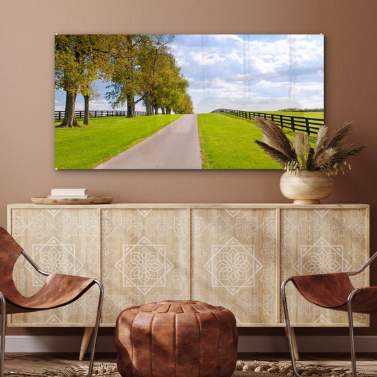 MuchoWow® Glasschilderij 120x60 cm - Schilderij acrylglas - Wolken - Bomen - Weg - Foto op glas - Schilderijen