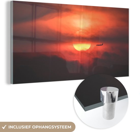MuchoWow® Glasschilderij 160x80 cm - Schilderij acrylglas - Zonsondergang met silhouet van vliegtuig - Foto op glas - Schilderijen