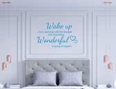 Stickerheld - Muursticker "Wake up every morning that something wonderful is going to happen" Quote - Slaapkamer - Hartjes - Engelse Teksten - Mat Middenblauw - 55x88.2cm