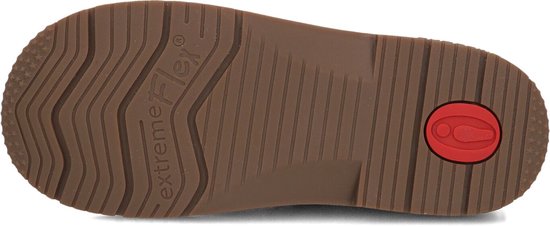 Onderkant van een bruine schoen met 'extremeFlex' en een rode cirkel.