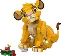 Gele LEGO Simba welp, zittend, met groene plant.