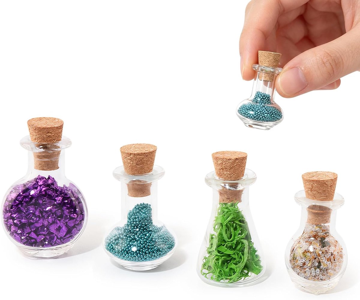 Accessoires Elexier Set, 4 miniatuurflesjes met toverpoeder