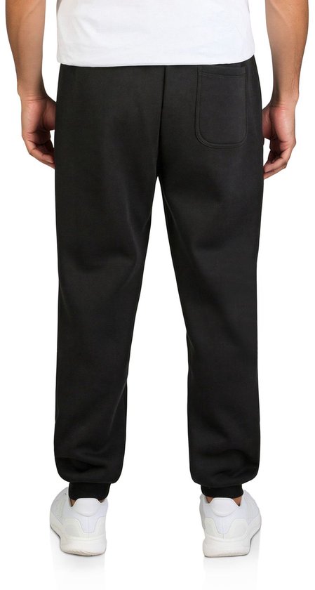 Achterkant van een zwarte Jack & Jones joggingbroek met een zak aan de achterzijde.