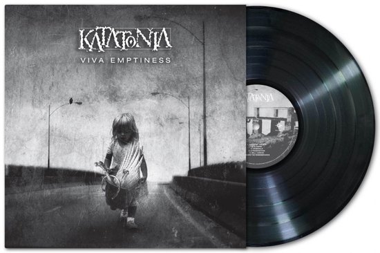 Vinylplaat Katatonia 'Viva Emptiness' met hoes waarop een kind met vleugels op een weg bij zonsondergang staat.