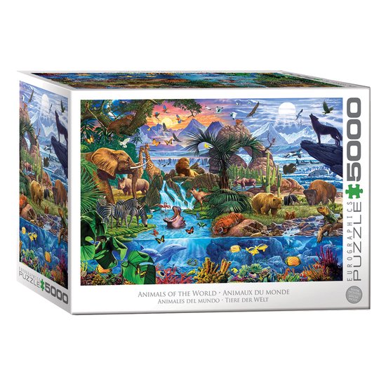 Doos van de "Animals of the World" 5000-delige puzzel met een kleurrijke afbeelding van diverse dieren in hun natuurlijke habitat, van bergen tot de oceaan.