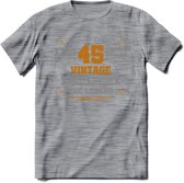 45 Jaar Legend T-Shirt | Goud - Zilver | Grappig Verjaardag Cadeau | Dames - Heren | - Donker Grijs - Gemaleerd - M