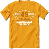 49 Jaar Legend T-Shirt | Goud - Wit | Grappig Verjaardag en Feest Cadeau Shirt | Dames - Heren - Unisex | Tshirt Kleding Kado | - Geel - XL