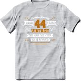 44 Jaar Legend T-Shirt | Goud - Wit | Grappig Verjaardag en Feest Cadeau Shirt | Dames - Heren - Unisex | Tshirt Kleding Kado | - Licht Grijs - Gemaleerd - L