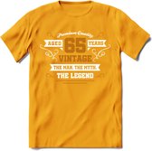 65 Jaar Legend T-Shirt | Goud - Wit | Grappig Verjaardag en Feest Cadeau Shirt | Dames - Heren - Unisex | Tshirt Kleding Kado | - Geel - XXL