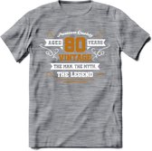 80 Jaar Legend T-Shirt | Goud - Wit | Grappig Verjaardag en Feest Cadeau Shirt | Dames - Heren - Unisex | Tshirt Kleding Kado | - Donker Grijs - Gemaleerd - 3XL