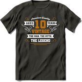 10 Jaar Legend T-Shirt | Goud - Wit | Grappig Verjaardag en Feest Cadeau Shirt | Dames - Heren - Unisex | Tshirt Kleding Kado | - Donker Grijs - L