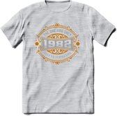 1982 The One And Only T-Shirt | Goud - Zilver | Grappig Verjaardag  En  Feest Cadeau | Dames - Heren | - Licht Grijs - Gemaleerd - L