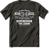 34 Jaar Legend T-Shirt | Zilver - Wit | Grappig Verjaardag en Feest Cadeau | Dames - Heren - Unisex | Kleding Kado | - Donker Grijs - 3XL