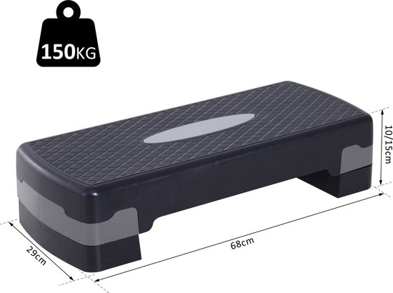 Zwarte step met grijze accenten, 68x29x10/15 cm, met 150kg gewichtslimiet indicatie.
