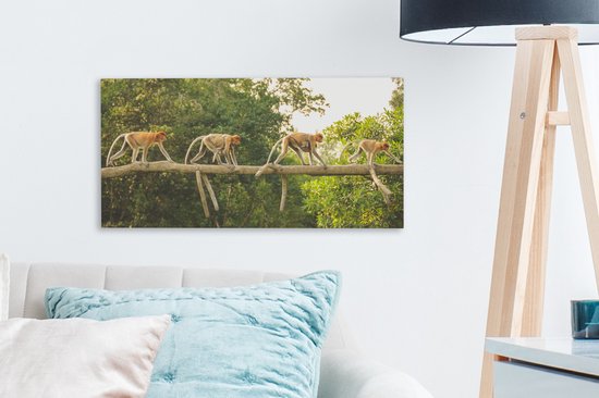 Tableau sur toile Singes marchant sur une branche - 40x20 cm - Décoration murale