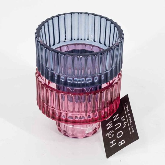 Omkeerbare waxinelichthouder van glas, blauw aan de ene kant en roze aan de andere, met verticale ribbels.