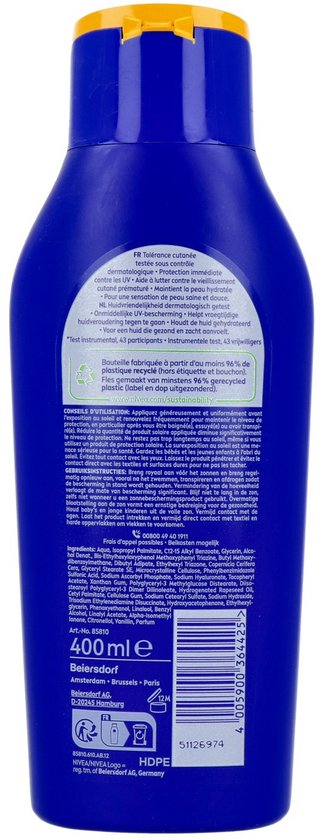 Blauwe fles met gele dop, met gebruiksinstructies en ingrediëntenlijst.