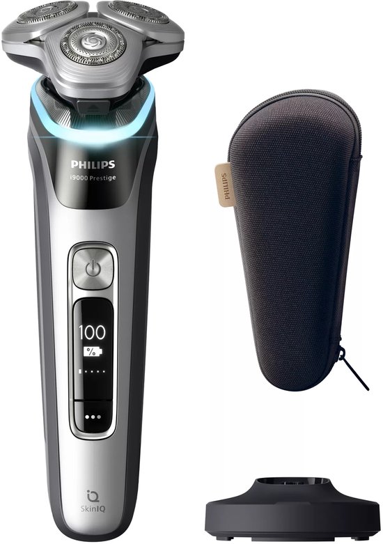 Philips Shaver 9000 Prestige scheerapparaat in zilver, met oplader, reis-etui en oplaadstandaard.