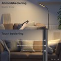 Afstandsbediening van de zwarte staande lamp en close-up van touch bediening op de stang.