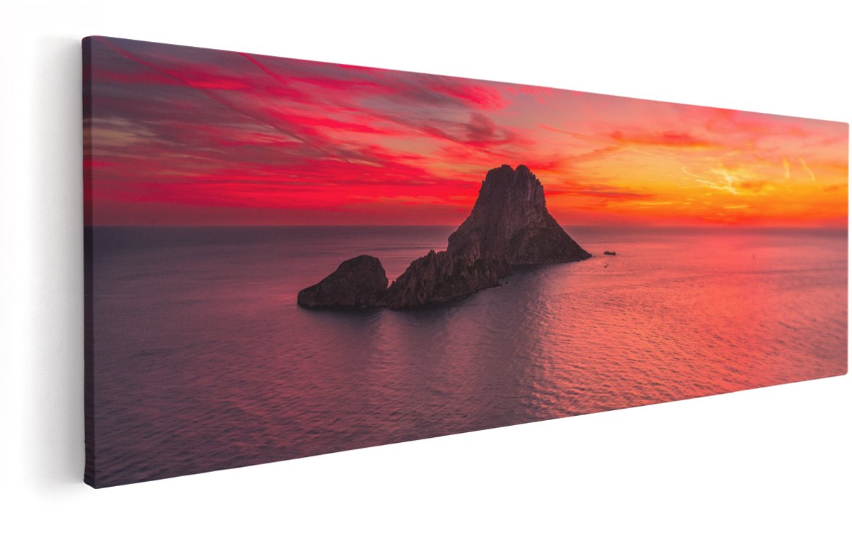 Artaza Canvas Schilderij Ibiza Rotsen Eiland bij Zonsondergang - 150x50 cm - Groot - Wanddecoratie Woonkamer - Schilderijen - Muurdecoratie