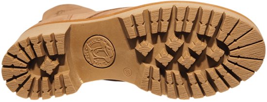 Profiel van de dikke rubberen zool van een lichtbruine leren veterboot.