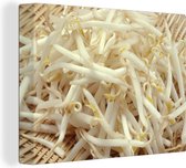 Tableau sur toile Tas de germes de soja sur une surface tressée - 120x90 cm - Décoration murale