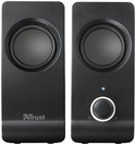 Twee zwarte Trust speakers met ronde speakers en een volumeknop op de rechter speaker.
