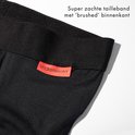 Detail van de zwarte boxer met een oranje label van Undiemeister. Zachte tailleband met geborstelde binnenkant.