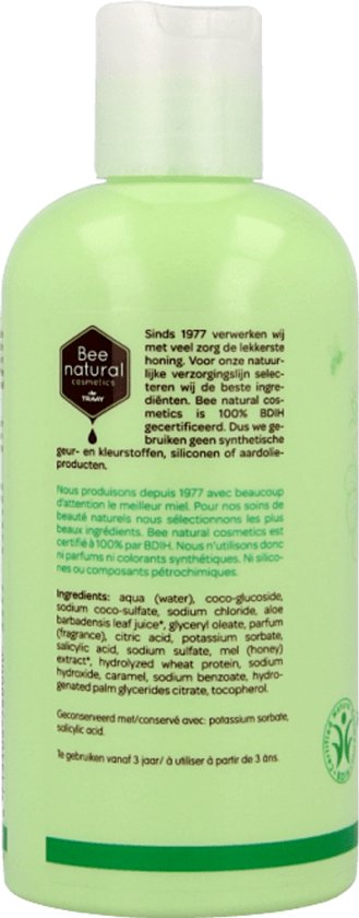 Achterkant lichtgroene fles shampoo met ingrediëntenlijst en logo's. Tekst in het Nederlands en Frans.
