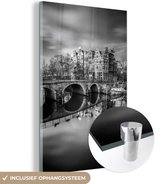MuchoWow® Glasschilderij 120x180 cm - Schilderij acrylglas - Typische herfstimpressie van de Prinsengracht in Amsterdam - zwart wit - Foto op glas - Schilderijen