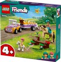 Set de remorque à chevaux LEGO Friends avec deux voitures, chevaux, poney, figurines, soleil et arbres.