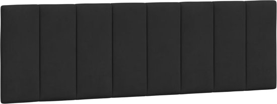 Tête de lit en velours noir avec panneaux verticaux.