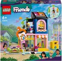 Ensemble de magasin de vêtements vintage LEGO Friends avec figurines et accessoires.