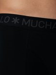 Close-up van een zwarte Muchachomalo boxershort met logo op de tailleband.