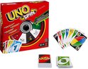 UNO Spin bordspel met rode doos, spinwiel, speelkaarten en een stapeltje kaarten.